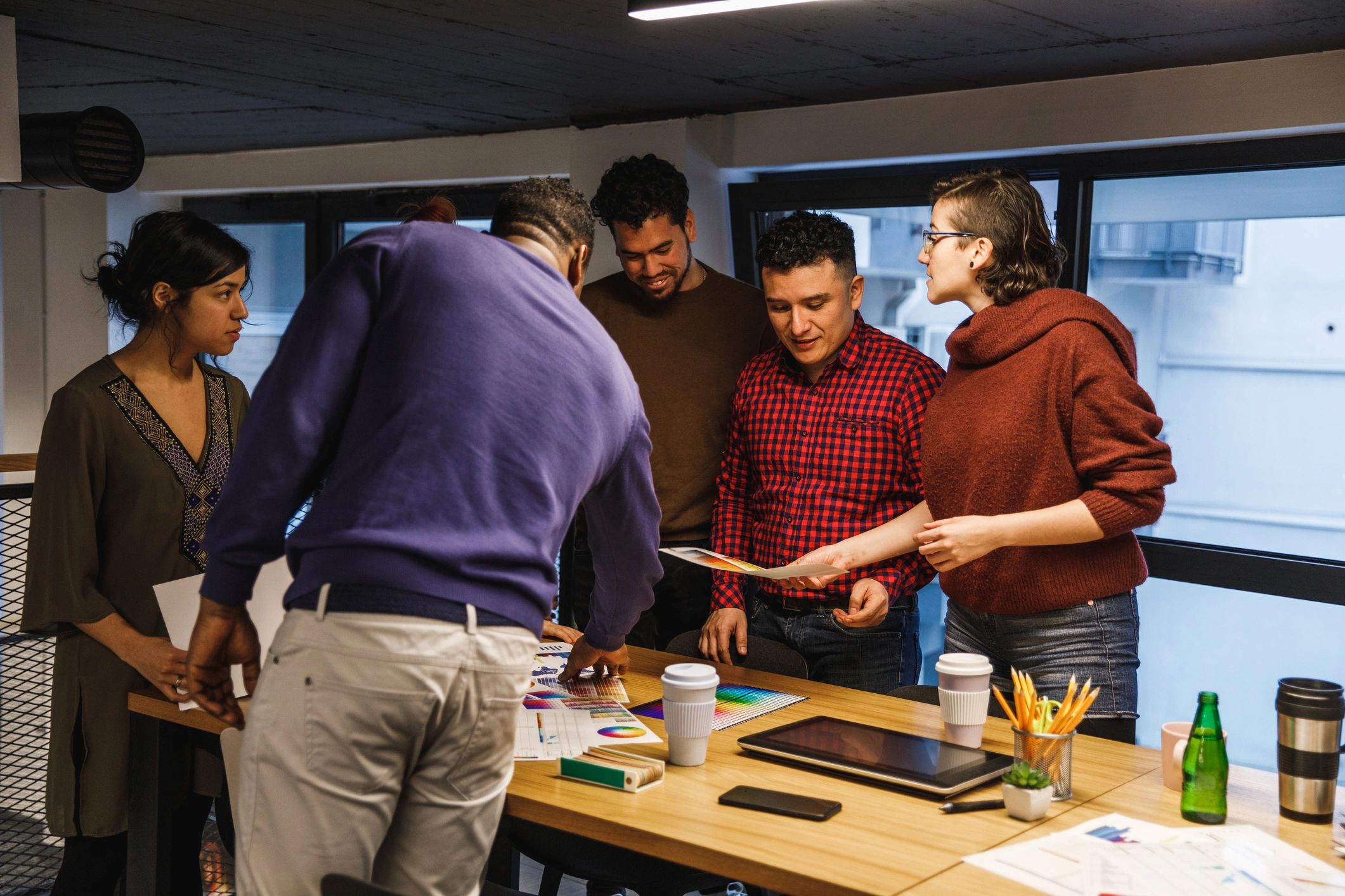 Diverse professionals collaborating on ideas in an office